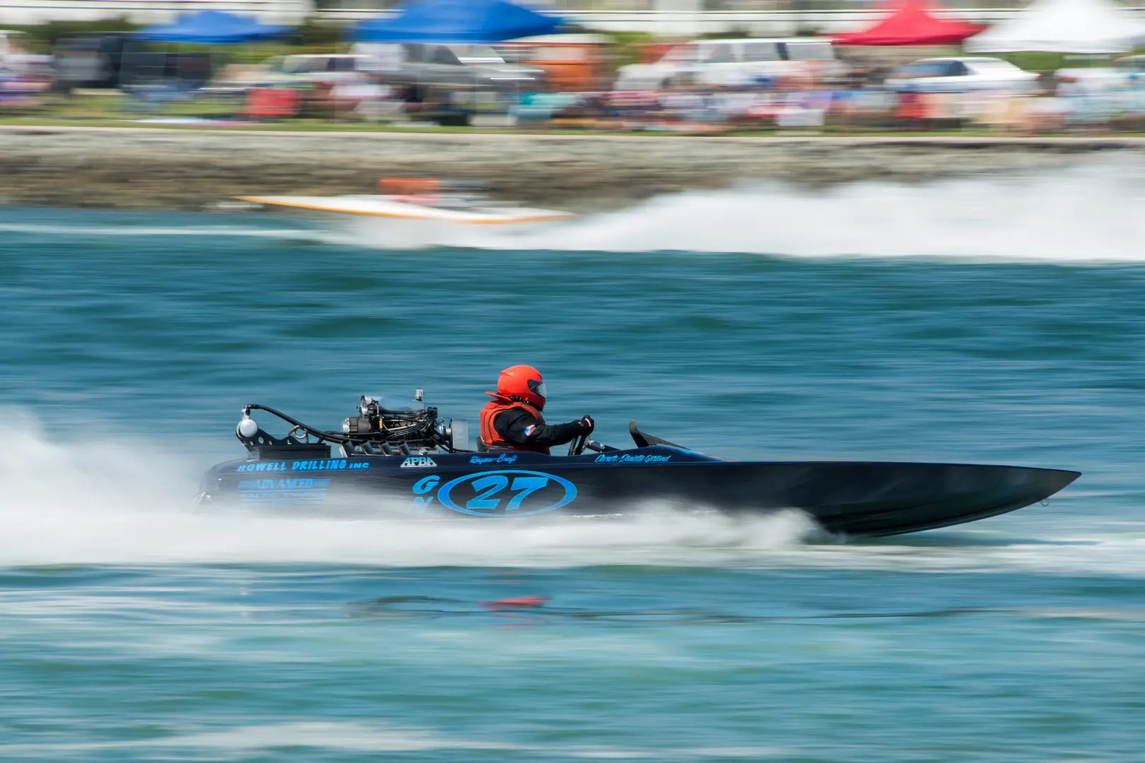 A person in a boat on the water.